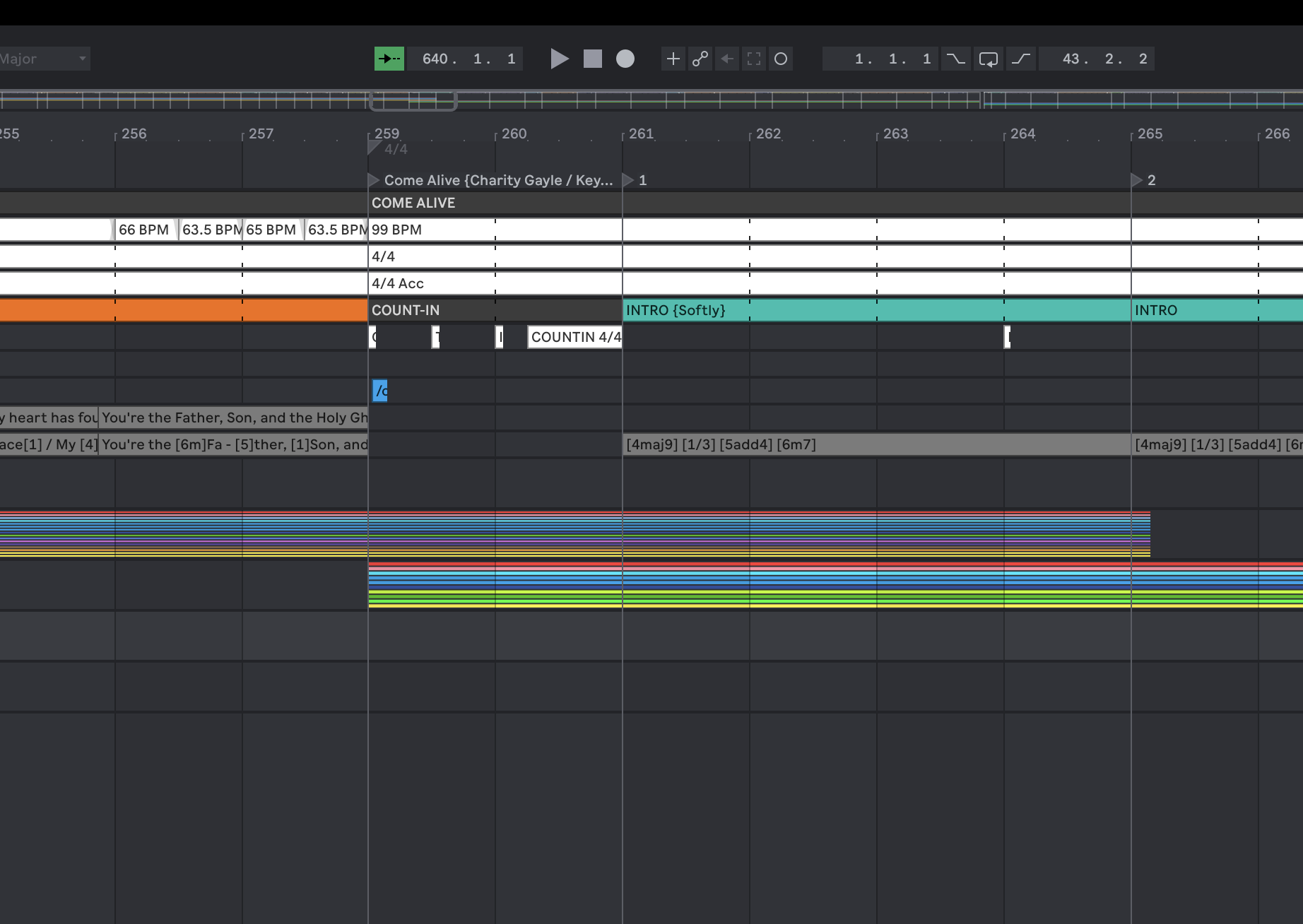 An overlap in the built set: the outgoing song's final bars sit under the incoming song, each at its own tempo.
